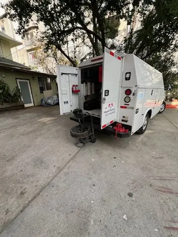 Magnet Plumbing service vehicle on-site for Grease Trap Cleaning in Yucca Corridor